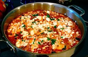 Shakshuka - (poached eggs in spicy tomato sauce)