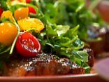 Rosemary-Garlic Steaks with Romaine, Tomatoes, and Romano Cheese