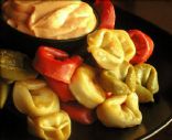 Tortellini with roasted garlic sauce