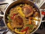 Caribbean Pork Chops with Glazed Bell Peppers and Rice