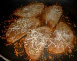 CROSTINI BREAD SLICES WITH OREGANO, GARLIC POWDER AND PARMESAN