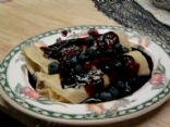 Crepes with cottage cheese blueberry-vanilla filling and blueberry sauce