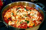 Shakshuka - (poached eggs in spicy tomato sauce)